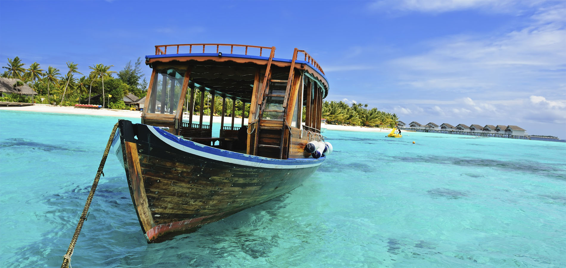 Home 1900x900 Maldives Vakantie Strand Original Asia Istock strand eiland mooi dhoni bootje