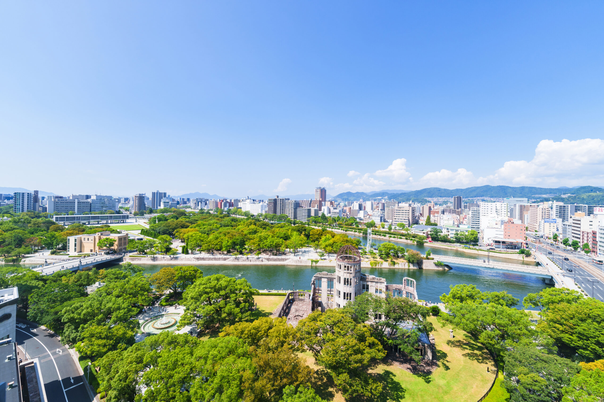 Home-Original-Asia-Rondreis-Japan-Vakantie-Istock-Hiroshima-skyline-stad-aerial-panorama-scaled.jpg